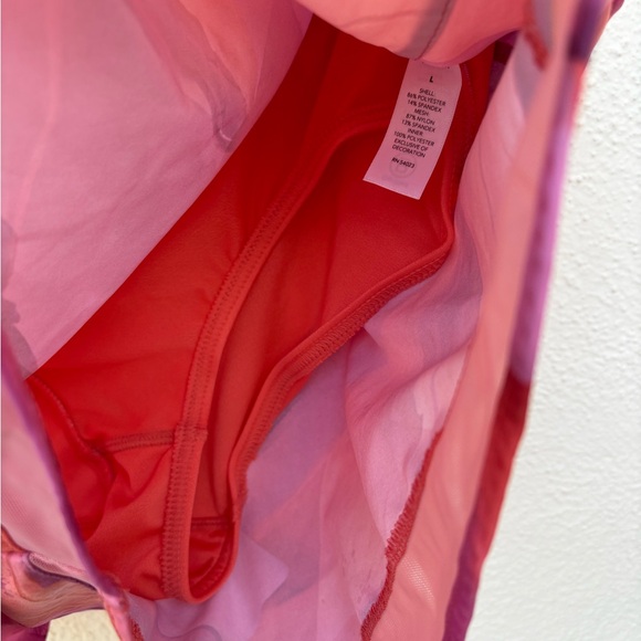 Athleta Printed Mesh Racer Run Shorts Training
Running Athletic - Size L - Picture 7 of 11